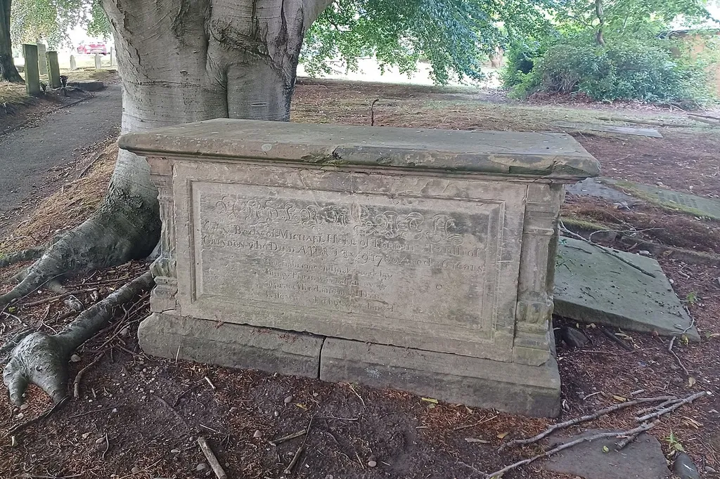 Grade II listed chest tomb in the churchyard of St Giles the Abbot's parish church, Cheadle, Staffordshire. Listed as "Hall Memorial approximately 50 metres south east of Church of St Giles". .mw-parser-output .messagebox{margin:4px 0;width:auto;border-collapse:collapse;border:2px solid var(--border-color-progressive,#6485d1);background-color:var(--background-color-neutral-subtle,#fbfcff);color:var(--color-base,#202122);box-sizing:border-box;border-inline-start-width:8px}.mw-parser-output .messagebox.mbox-small{font-size:88%;line-height:1.25em}.mw-parser-output .mbox-warning,.mw-parser-output .mbox-speedy{border:2px solid var(--border-color-error,#b22222);background:var(--background-color-error-subtle,#ffdbdb);border-inline-start-width:8px}.mw-parser-output .mbox-serious,.mw-parser-output .mbox-delete,.mw-parser-output .mbox-stop{border:2px solid var(--border-color-error,#b22222);border-inline-start-width:8px}.mw-parser-output .mbox-issue,.mw-parser-output .mbox-content{border:2px solid #f28500;background:var(--background-color-warning-subtle,#ffe);border-inline-start-width:8px}.mw-parser-output .mbox-query,.mw-parser-output .mbox-style{border:2px solid #f4c430;background:var(--background-color-warning-subtle,#ffe);border-inline-start-width:8px}.mw-parser-output .mbox-shit{border:2px solid #960;border-inline-start-width:8px}.mw-parser-output .mbox-license{border:2px solid #88a;border-inline-start-width:initial}.mw-parser-output .mbox-legal{border:2px solid var(--border-color-notice,#666);background:var(--background-color-base,#fff);border-inline-start-width:8px}.mw-parser-output .mbox-honor{border:2px solid #ca3;background:var(--background-color-warning-subtle,#fcf4db);border-inline-start-width:8px}.mw-parser-output .mbox-growth{border:2px solid #8d4;background:var(--background-color-success-subtle,#d5fdf4);border-inline-start-width:8px}.mw-parser-output .mbox-move{border:2px solid #93c;border-inline-start-width:8px}.mw-parser-output .mbox-protection,.mw-parser-outp