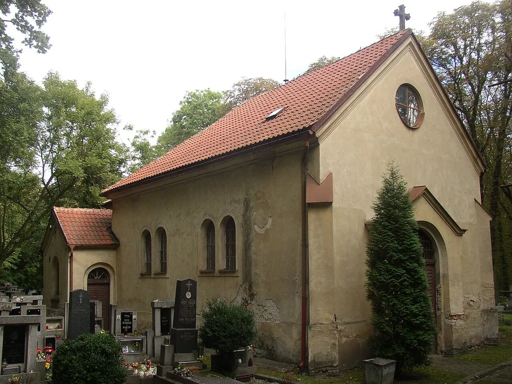 Church of Saint John the Baptist near Dubí, eastern suburb of Kladno city, Kladno District, Central Bohemian Region Czech Republic. The Gothic 14th century church, located lonely amidst forest, is the sole preserved remnant of medieval village of Újezdec (aka Újezd), deserted during one of domestic wars around 1450. A view from the west.