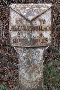 Milepost, W of Industrial estate; 200m from railway bridge