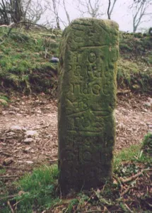 Milestone, in village on Sandybed Lane behind church northwards