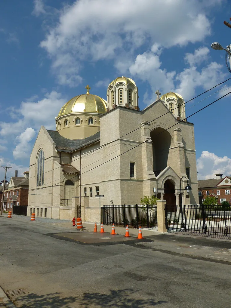 Holy Trinity Church, a Greek Orthodox Church located at 62 Lewis Street, Lowell, Massachusetts. West and south (front) sides shown.