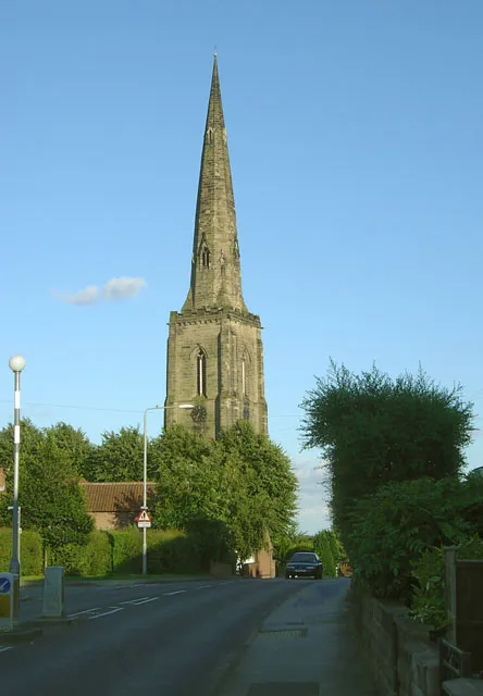 West tower and broach spire of All Hallows parish church, Gedling, Nottinghamshire. Note the entasis (curvature) of the spire, applied to correct perspective distortion.