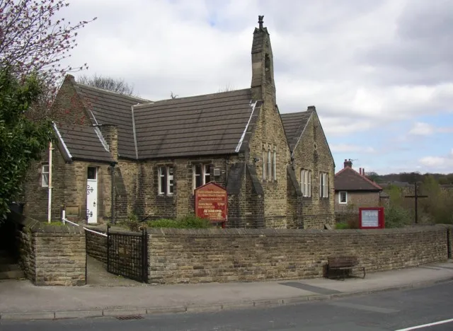 St Hilda's parish church, Netheroyd Hill Road, Cowcliffe, West Yorkshire, seen from the south. The foundation stone was laid in 1919, and a mid-20th-century map shows it as a school.