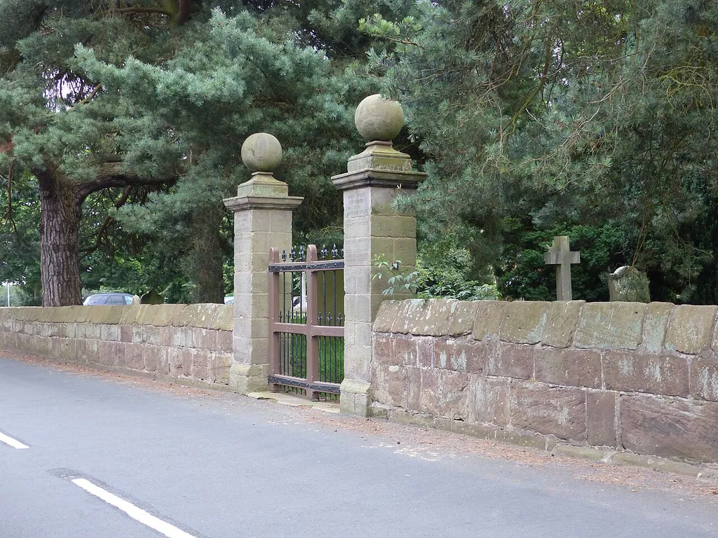 North gates to St Boniface's Churchyard, Bunbury, Cheshire. Grade II listed building. .mw-parser-output .messagebox{margin:4px 0;width:auto;border-collapse:collapse;border:2px solid var(--border-color-progressive,#6485d1);background-color:var(--background-color-neutral-subtle,#fbfcff);color:var(--color-base,#202122);box-sizing:border-box;border-inline-start-width:8px}.mw-parser-output .messagebox.mbox-small{font-size:88%;line-height:1.25em}.mw-parser-output .mbox-warning,.mw-parser-output .mbox-speedy{border:2px solid var(--border-color-error,#b22222);background:var(--background-color-error-subtle,#ffdbdb);border-inline-start-width:8px}.mw-parser-output .mbox-serious,.mw-parser-output .mbox-delete,.mw-parser-output .mbox-stop{border:2px solid var(--border-color-error,#b22222);border-inline-start-width:8px}.mw-parser-output .mbox-issue,.mw-parser-output .mbox-content{border:2px solid #f28500;background:var(--background-color-warning-subtle,#ffe);border-inline-start-width:8px}.mw-parser-output .mbox-query,.mw-parser-output .mbox-style{border:2px solid #f4c430;background:var(--background-color-warning-subtle,#ffe);border-inline-start-width:8px}.mw-parser-output .mbox-shit{border:2px solid #960;border-inline-start-width:8px}.mw-parser-output .mbox-license{border:2px solid #88a;border-inline-start-width:initial}.mw-parser-output .mbox-legal{border:2px solid var(--border-color-notice,#666);background:var(--background-color-base,#fff);border-inline-start-width:8px}.mw-parser-output .mbox-honor{border:2px solid #ca3;background:var(--background-color-warning-subtle,#fcf4db);border-inline-start-width:8px}.mw-parser-output .mbox-growth{border:2px solid #8d4;background:var(--background-color-success-subtle,#d5fdf4);border-inline-start-width:8px}.mw-parser-output .mbox-move{border:2px solid #93c;border-inline-start-width:8px}.mw-parser-output .mbox-protection,.mw-parser-output .mbox-message{border:2px solid var(--border-color-base,#aaa);border-inline-start-width:8px}.mw-parser-o
