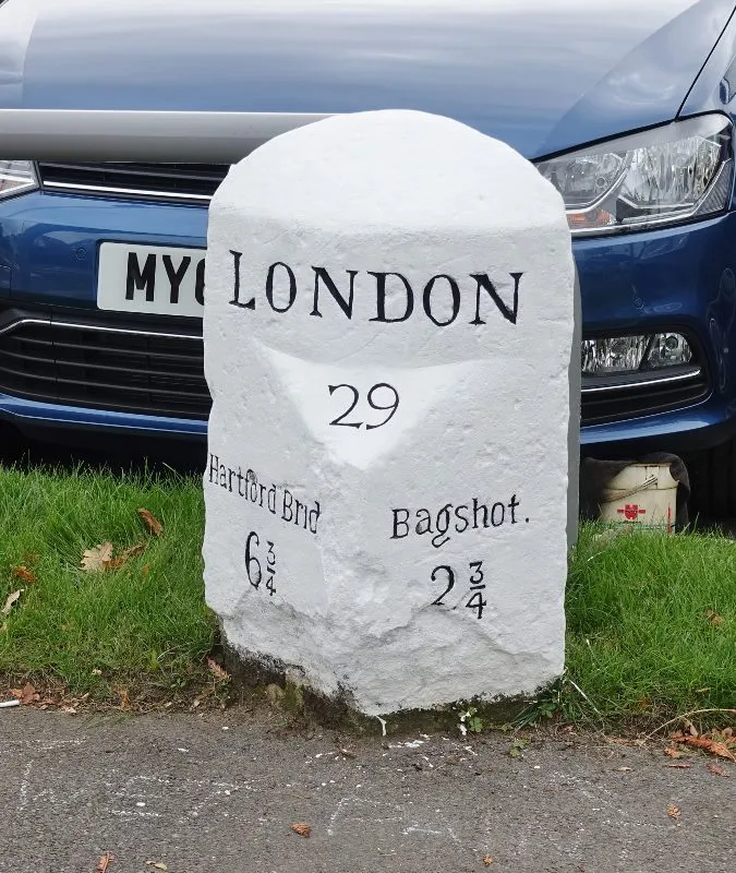 Milestone, London Road, opp. No. 116, by Whites Car sales lot; 50m E of traffic lights,