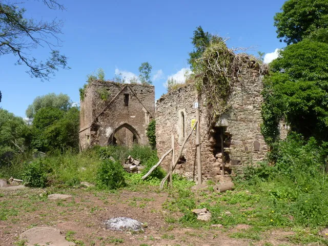 The ruins of St Mary's parish church, Avenbury, Herefordshire, seen from the southeast. Centre left is the 13th-century west tower. On the right is the chancel.