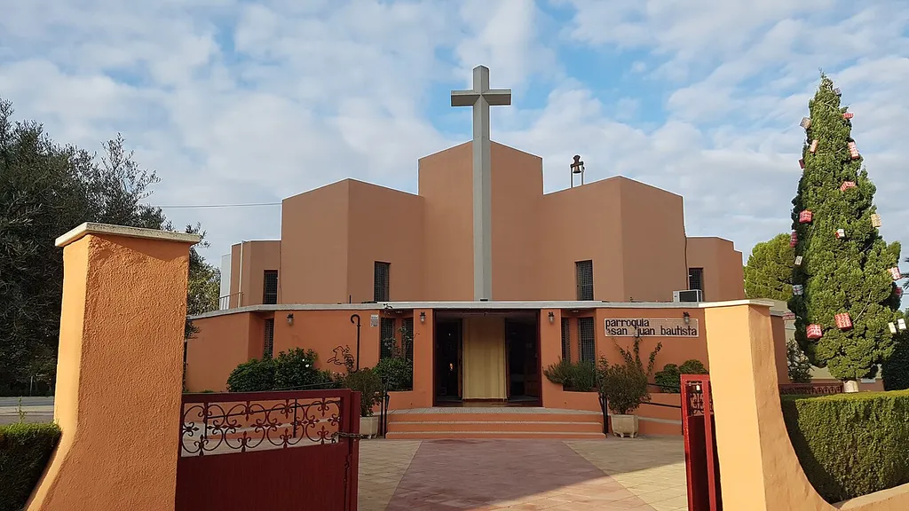 The Church of San Juan Bautista, located in the Ensanche-Almarjal neighborhood of Cartagena (Spain). Laying the first stone by Bishop Javier Azagra Labiano on December 14, 1986, the construction works were extended between May 1987 and March 1988, being consecrated on June 19 of the same year.