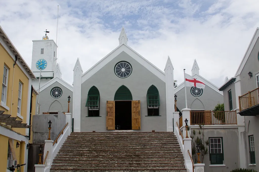 View of front of St. Peter's Church, St. George's, Bermuda. The church's clock tower is visible at left.