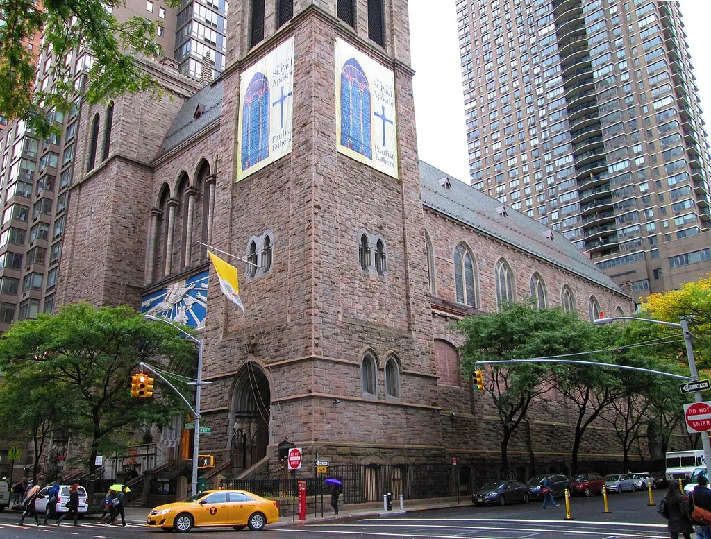 The Roman Catholic Church of St. Paul the Apostle at 10 Columbus Avenue between West 59th and 60th Streets in the Upper West Side neighborhood of Manhattan, New York City, was built in 1876-1884 and was designed by Jeremiah O'Rourke and George Deshon in the Gothic revival style. The home church of the Paulist Fathers, it was once the second larges church in the country. The interior includes a baldachin by Stanford White and mosaic floor tiles by Bertram Grosvenor Goodhue. (Source: From Abyssinian to Zion (2004))
