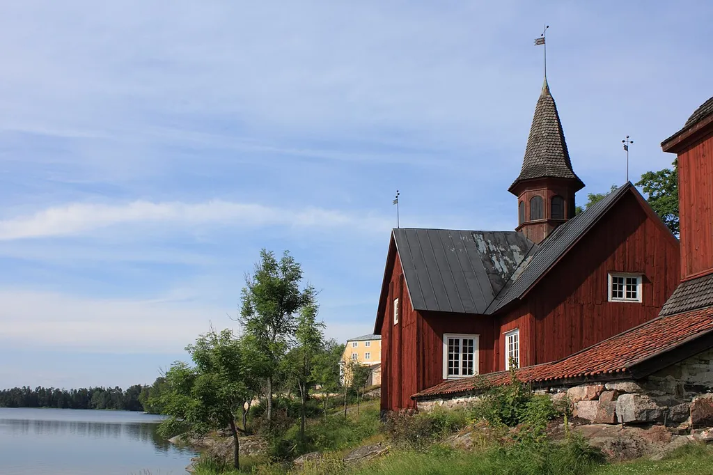 Fagervik church and manor in the background by Bruksträsket lake