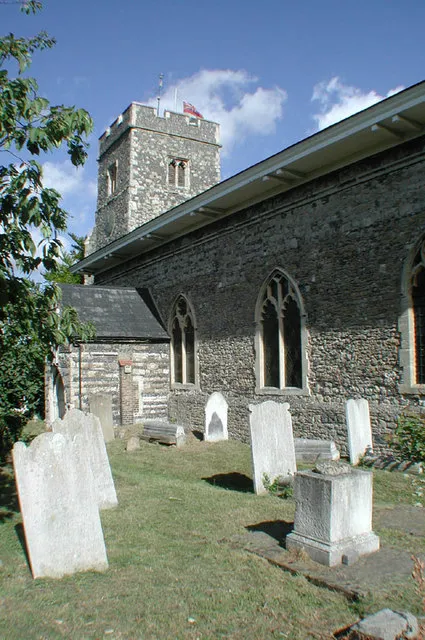 Part of the parish church of SS Peter and Paul, Milton-next-Gravesend, Kent, including the west tower and south porch, seen from the southeast