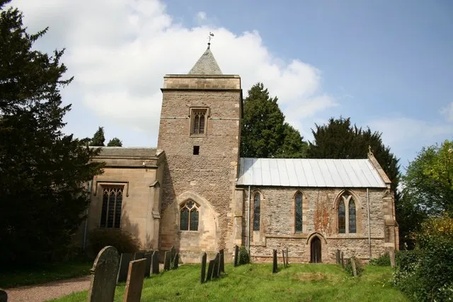 St.Augustine's church, Flintham. Once cruciform, the transept arches still evident outside on the 13th century tower. The nave is 1828 by Nicholson of Southwell and the chancel rebuilt by Hodgson Fowler in 1896.