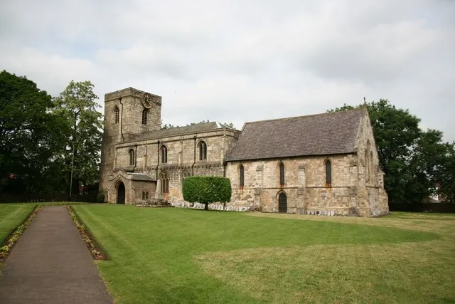 St.Oswald's church, Crowle. An ancient church with some good Norman and Early English work, inside part of a Saxon cross shaft with Norse carvings, probably 11th century.