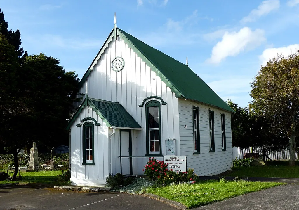 This quaint church, in late "timber Gothic" (note the medium, rather than high roof pitch), was built in 1874. The date is displayed within the decorative feature on the upper front facade. It is scheduled for protection by Manukau City. According to the book Historic buildings in Manukau City, by Manukau City Council, 1980, illustrated by Andrew Hall, the church was constructed for $440 on a site donated by Mr. Robert Wallace. Prominent members of the church gave their names to roads in the locality, including Wallace, Massey and Kirkbride. W. F. Massey was a former prime minister and the Rev Mr. Kirkbride led his flock from this church for a period.