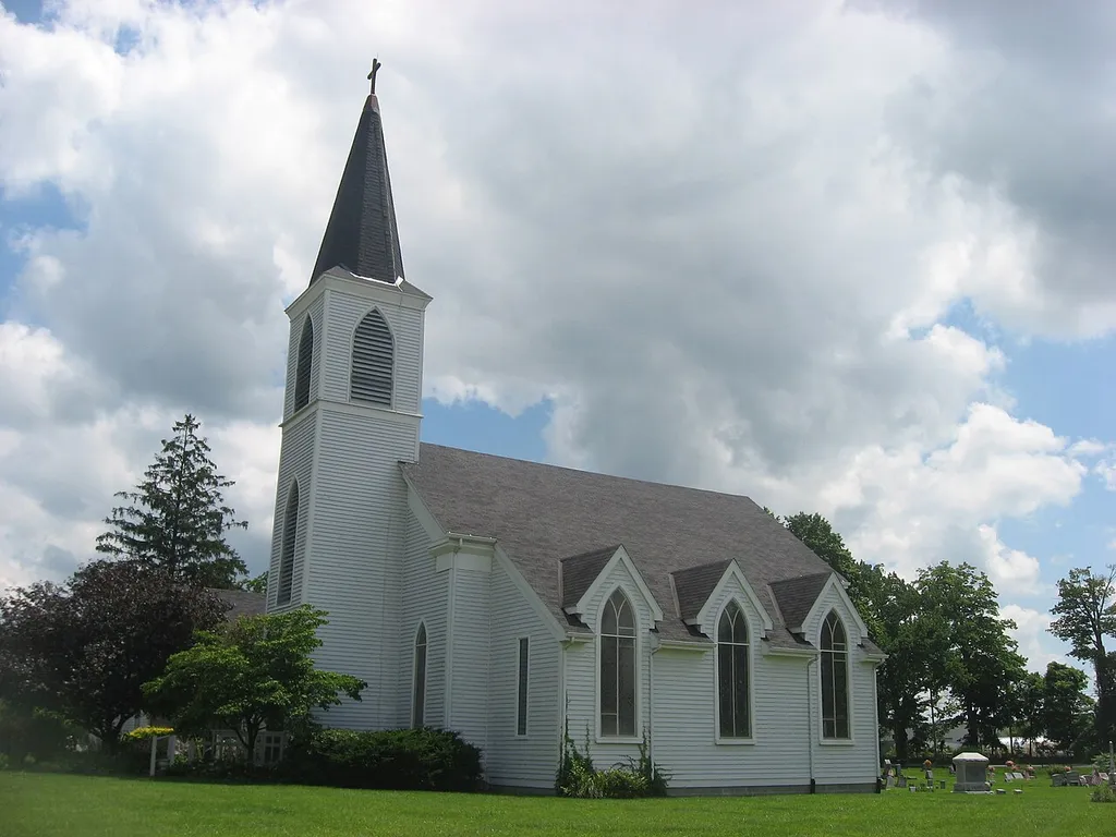 Western side of St. John of the Cross Episcopal Church, located at 601 E. Vistula Street (State Road 120) in Bristol, Indiana, United States. Built in 1830, it is listed on the National Register of Historic Places.