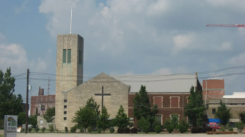 Front of St. John's United Church of Christ, located at 314 Market Street in Evansville, Indiana, United States. Its church hall (the brick building to the right), built in 1921, it is listed on the National Register of Historic Places.