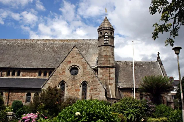 St Peter's Church, Newlyn In the cramped confines of Newlyn's narrow streets it is tricky getting a view of the whole church. This shot shows the southern aspect of the eastern half of the church. The parish of Newlyn was formed in 1848 as a response to the growth of this fishing village, the church however was not built for some years and was opened in 1866.