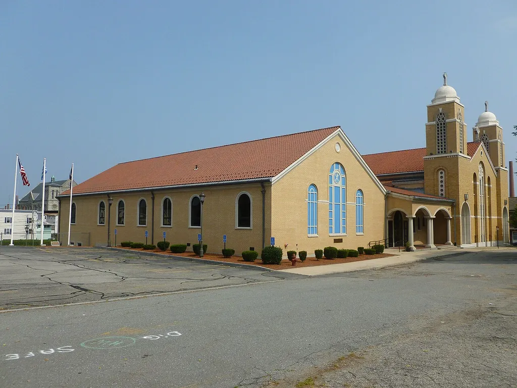 Transfiguration Greek Orthodox Church, located at 25 Friar John Sarantos Way, Lowell, Massachusetts. Northwest and southwest (front) sides of building shown.