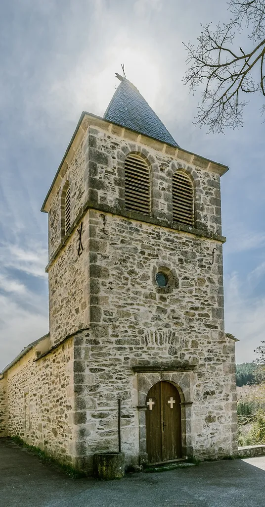 Saint John the Baptist church in La Clau in commune of Vézins-de-Lévézou, Aveyron, France