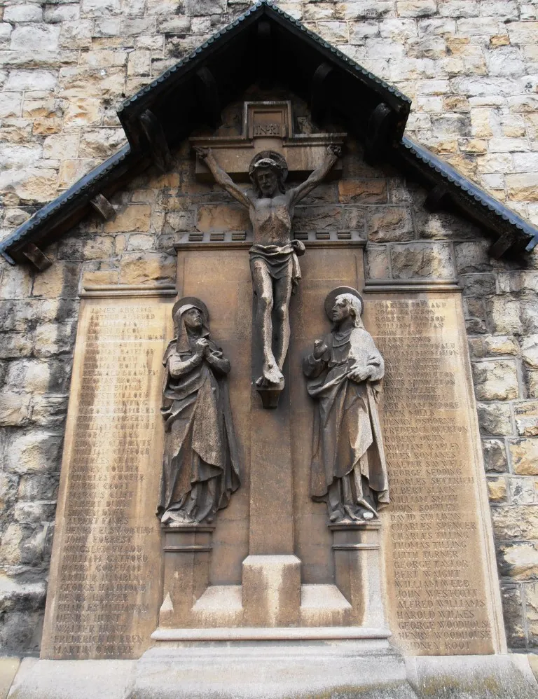 War Memorial in grounds St Mary Magdalene Munster Square London. Carved by Nathaniel Hitch