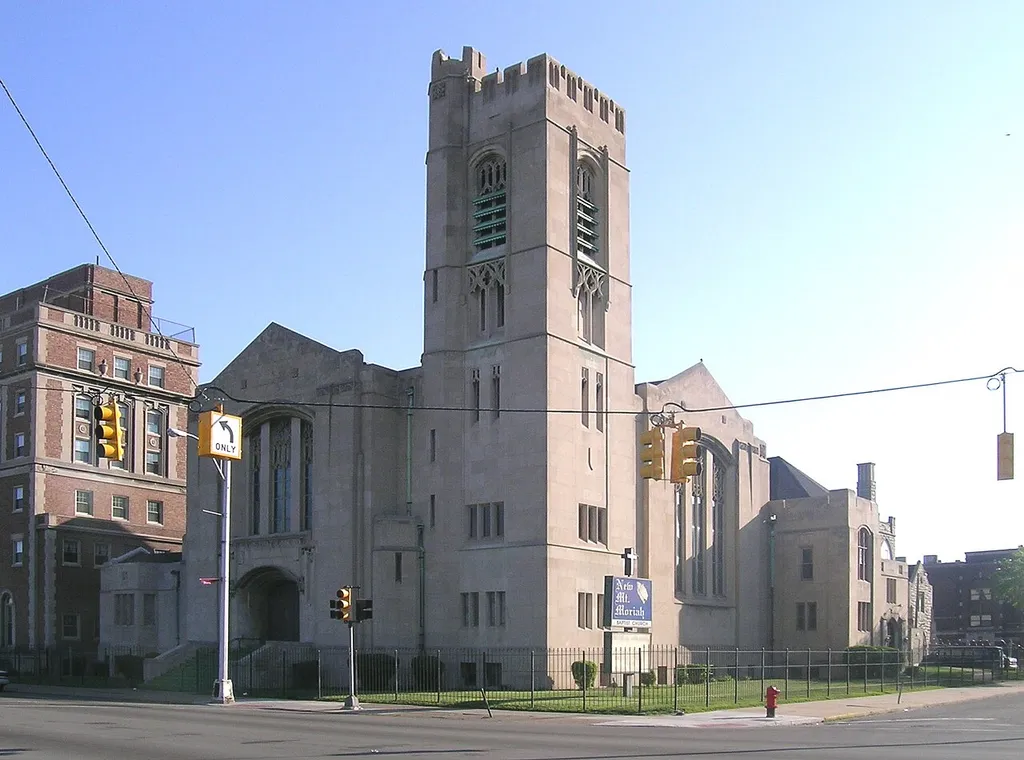 The historic Trinity United Methodist Church in Highland Park, Michigan, as seen here from across Woodward Avenue. The building has been listed on the National Register of Historic Places (NRHP). It continues to be operated as a church, although with a different resident congregation, under the name New Mount Moriah Baptist Church.