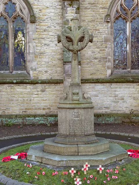 Photograph of the War Memorial in the churchyard of St Anne's Church, Sale, Greater Manchester, England