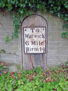 Milepost, opp. Church gate nr entrance to Rowington Hall