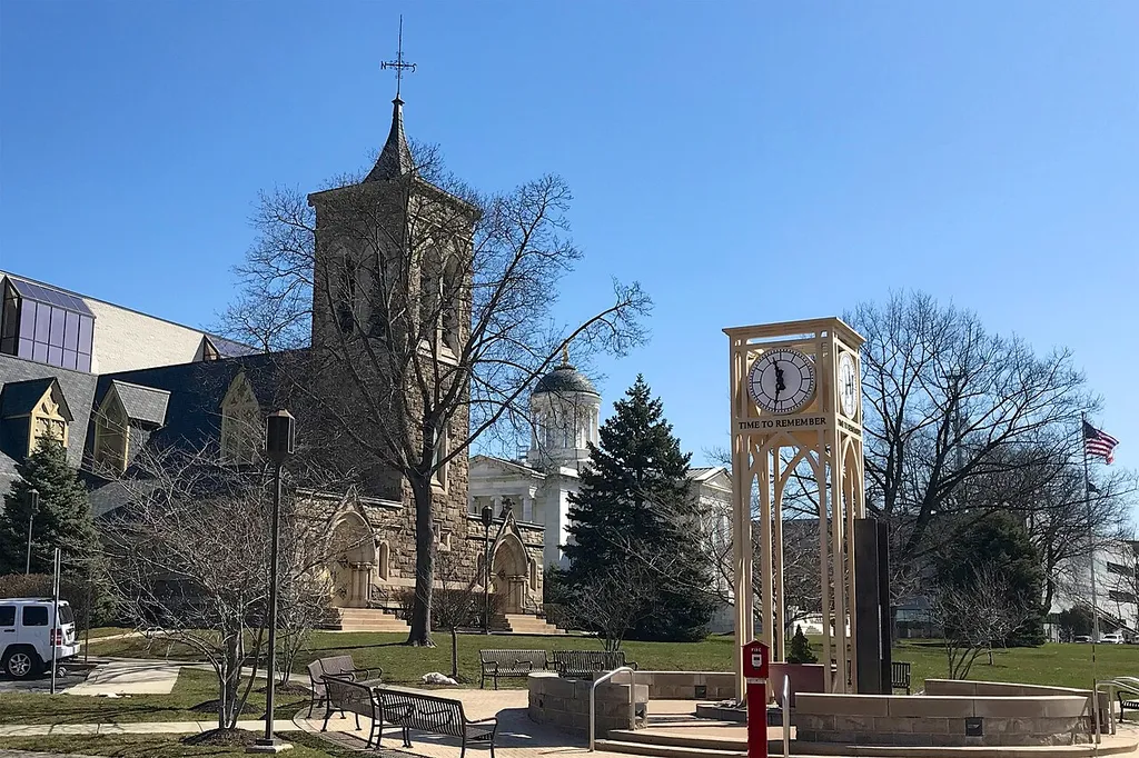 View of the Somerset Courthouse Green in Somerville, New Jersey. Time to Remember memorial, First Reformed Church of Raritan, and both current and historic Somerset Courthouses.