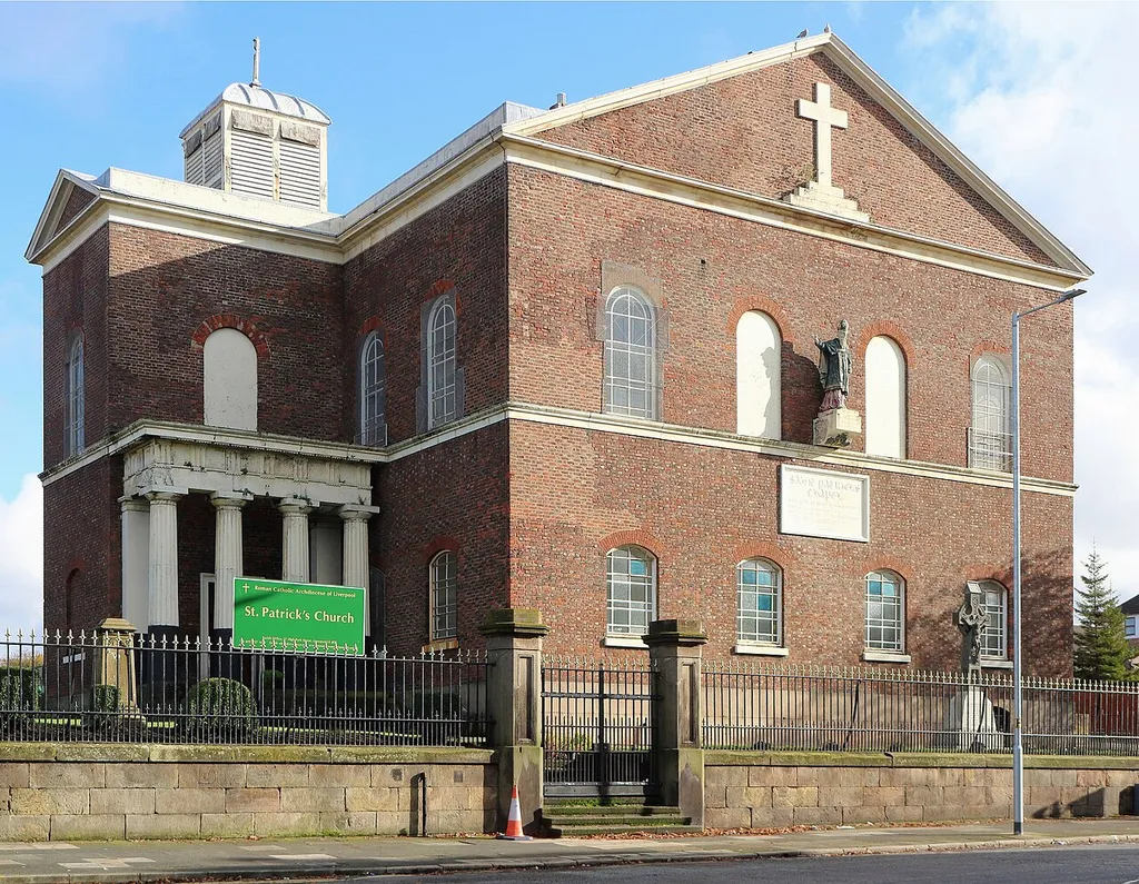 Grade II* RC chapel of St Patrick, Toxteth, Liverpool. View from corner of Hill Street, showing north wing and louvre at top.