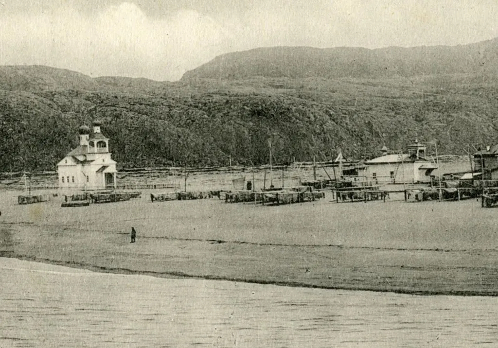 Landscape of Teriberka (now Murmansk Oblast, Russia) on a 1906 postcard. Church of Elijah the Prophet can be seen on the left
