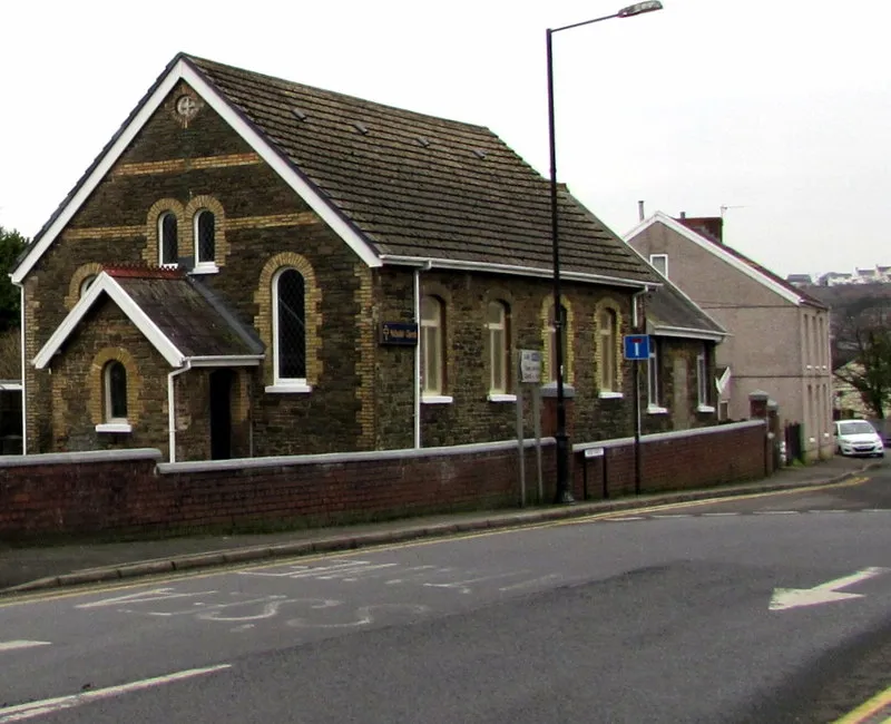 Wesley English Methodist Church in Pontarddulais. Viewed across Water Street. The church nameboard shows that the church was built in 1881.