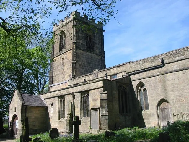 Nave, west tower, south porch and part of the chancel of All Saints' parish church, Brailsford, Derbyshire, seen from the southeast