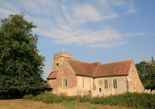 St Peter's Parish Church, Soberton. Seen from footpath through field to south of the church. Although the tree shown is a fine specimen, it rather obscures the best views of this church. See also 237679.