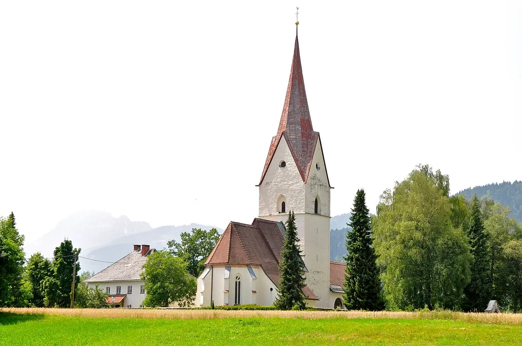 Parish church Saint Andrew and rectory (left hand) in Thoerl-Maglern-Greuth, municipality Arnoldstein, district Villach Land, Carinthia / Austria / EU