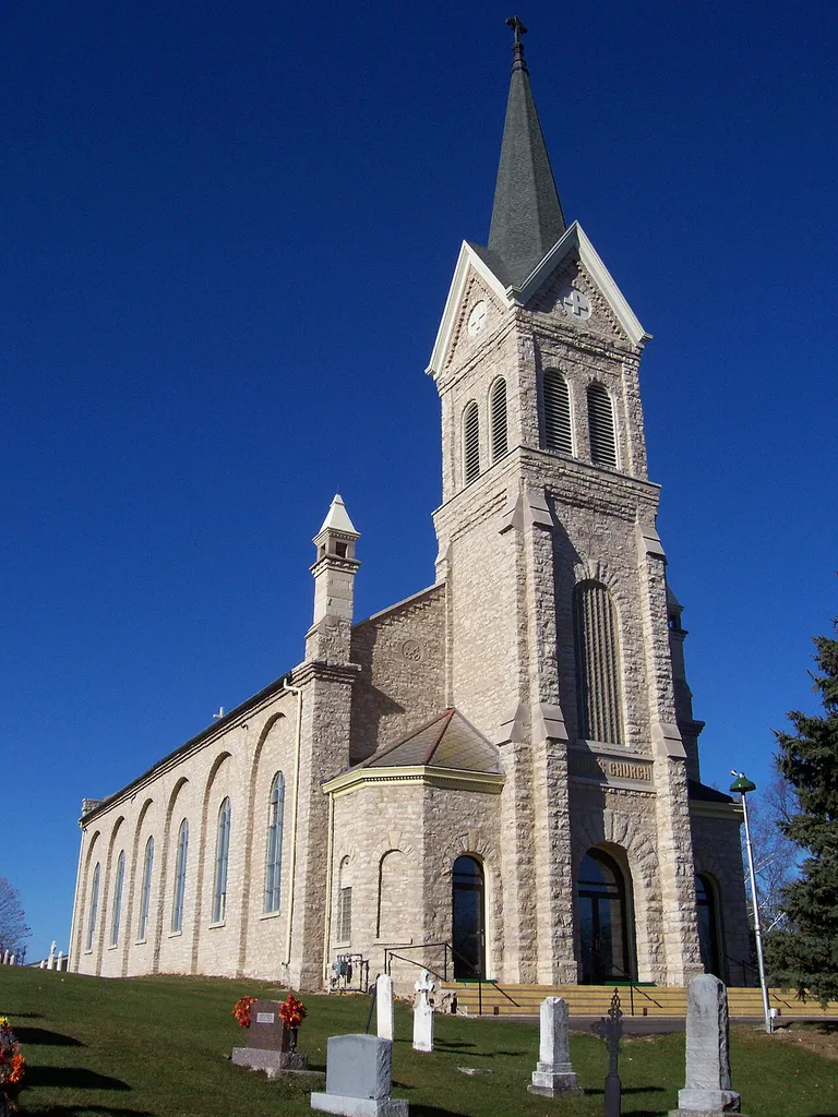 St. John the Baptist Roman Catholic Church in w:Johnsburg, Wisconsin, USA. It is listed on the Register of Historic Places. Related images are Image:StJohnTheBaptistParishRHPMarker.jpg and Image:FatherCasperRehrlMarker.jpg.