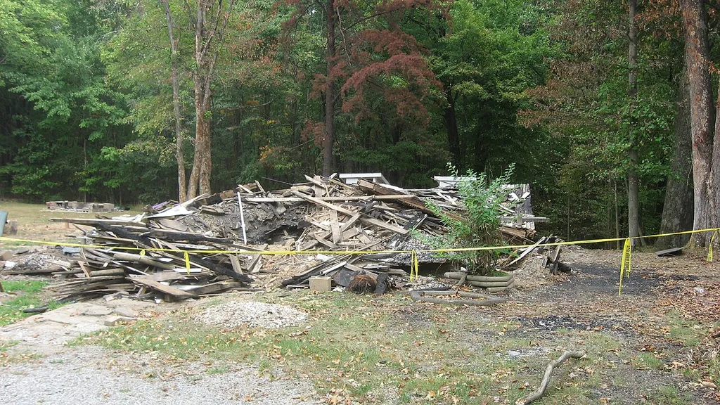 Southwestern side of a pile of rubble located along Grandview Road southeast of Nashville in Van Buren Township, Brown County, Indiana, United States. Until an arson on 14 July 2010, this pile of rubble was known as the Grandview Apostolic Church; built in 1892, the church was listed on the National Register of Historic Places in 1991, along with its outhouses and cemetery; the church was removed from the Register three months later. It was a part of the Apostolic Church.