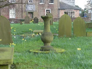 Sundial in churchyard to south west of Church of St John the Baptist