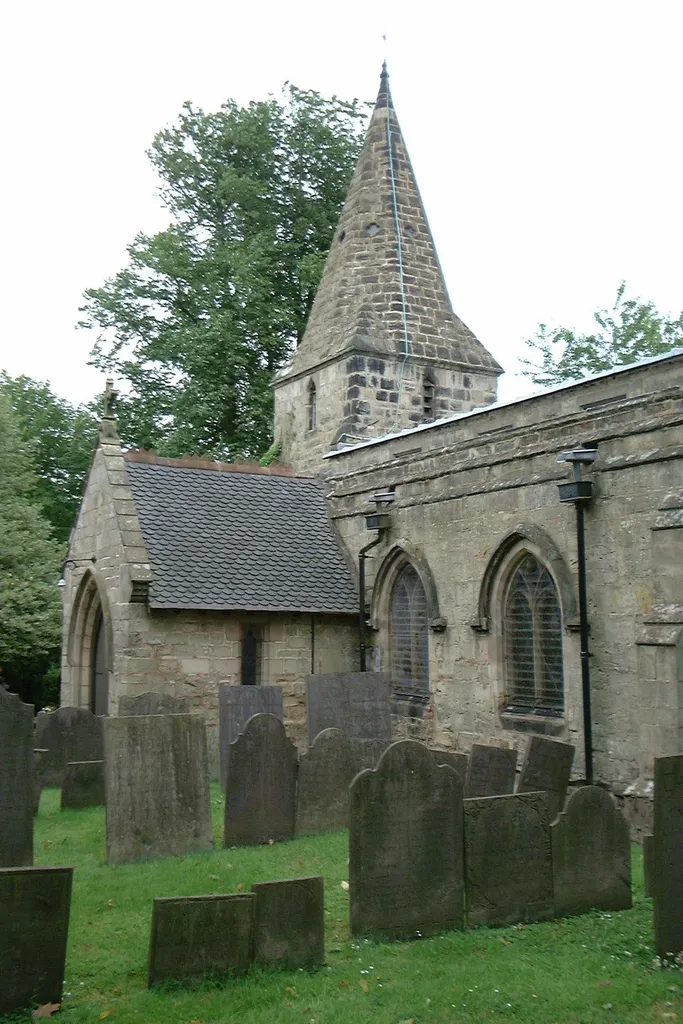 Spire and south porch of St Michael and All Angels parish church, Ravenstone, Leicestershire, seen from the east