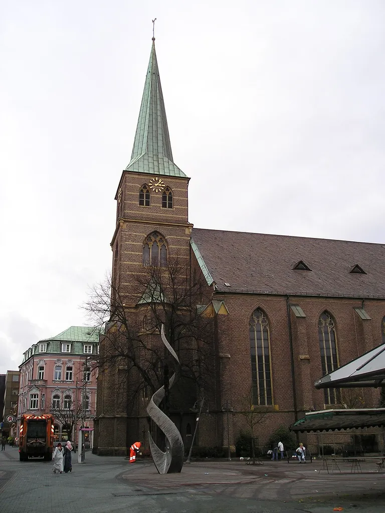Katholische Propsteikirche St. Cyriakus and sculpture Blühendes by Helmut Schlüter in Bottrop